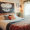 zmpzak_1._A_cozy_bedroom_with_a_minimalist_design_featuring_a_f_343a9b9f-b630-4a3b-a6b2-0ac4e6e7c41e